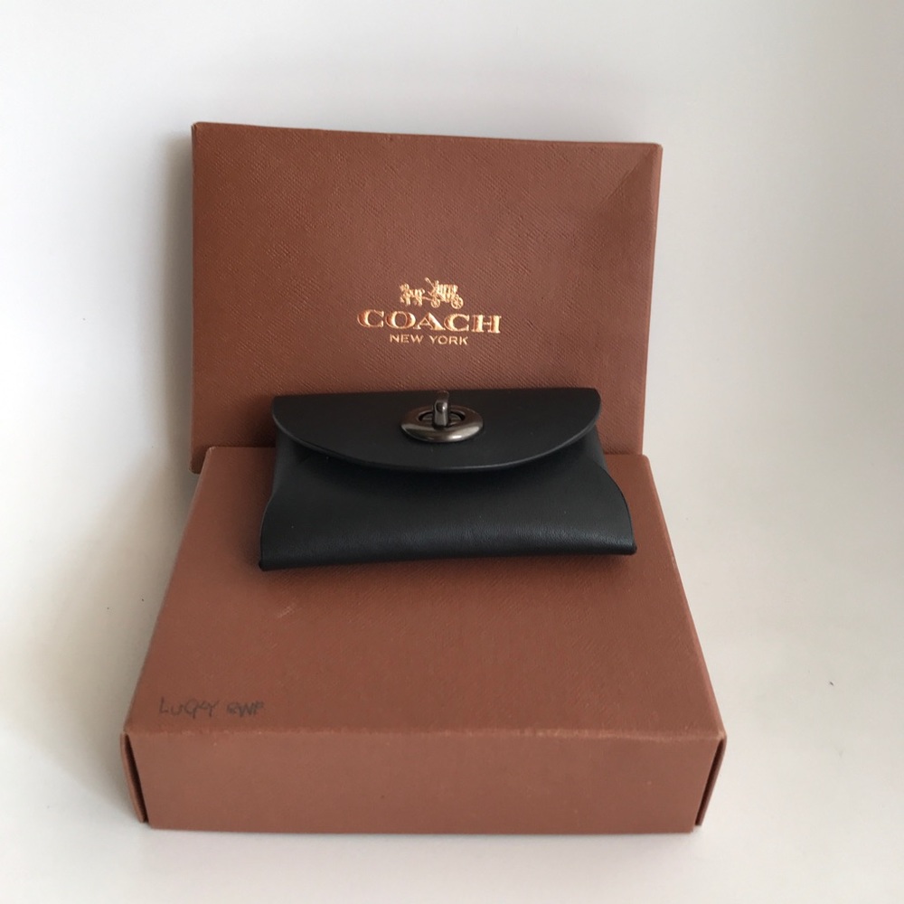 Coach “Lucky” coin purse in black